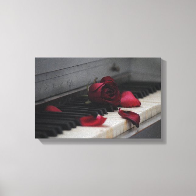 Lienzo Claves de piano con una rosa roja (Anverso)