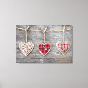 Lienzo Corazones sobre una tabla de madera