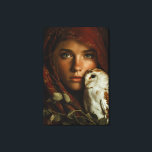 Lienzo Crimson Scarf Snowy Owl Portrait Mystery<br><div class="desc">A young woman with luminous green eyes looks straight ahead beneath a richly textured crimson headscarf that frames her face like a medieval veil. A snowy owl with delicate brown markings perches calmly on her shoulder, its gaze mirroring hers in quiet intensity. Golden autumn leaves cling to the fabric and...</div>