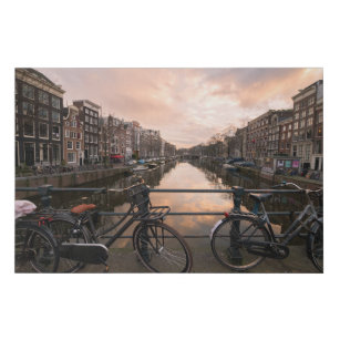 Lienzo De Imitación Bicicletas en la puesta del sol en Amsterdam