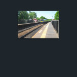 Lienzo Deighton Railway Station, Huddersfield<br><div class="desc">This dynamic photo captures a TransPennine Express train as it speeds through Deighton Railway Station in West Yorkshire. The clear blue sky and lush green trees highlight the classic British railway scene, making it a perfect piece for trainspotters, commuters, and lovers of UK transport. A fantastic addition to any product,...</div>