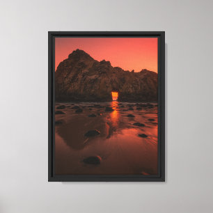 Lienzo El brillo de la puesta de sol a través del arco de