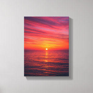 Lienzo El horizonte del atardecer sobre el mar tranquilo