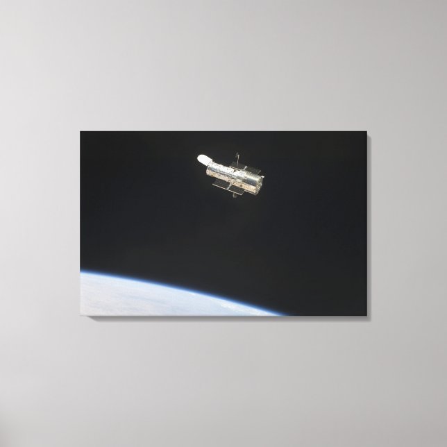 Lienzo El telescopio espacial Hubble en órbita sobre la T (Anverso)