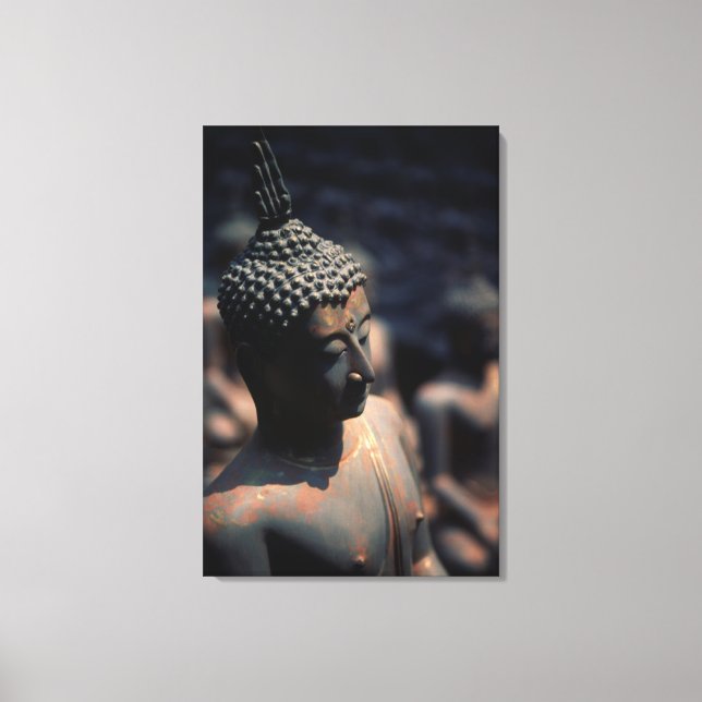 Lienzo Estatuas de Buda de fábrica (Anverso)