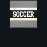 Lienzo FÚTBOL Esporádico Gris Rayo Blanco Rayos Amarillos<br><div class="desc">Este colorido diseño deportivo presenta el texto en negrita de SOCCER dentro de una amplia franja central horizontal negra con rayas de carreras blancas y amarillas doradas contra rayas externas grises. El texto se puede personalizar.</div>