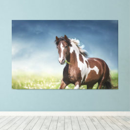 Lienzo Gallops de caballos de Pinto a través de la florid