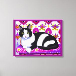 Lienzo Gato negro y blanco de esmoquin en un colchón