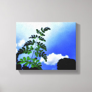 Lienzo Hojas verdes, cielo y fondo de nubes