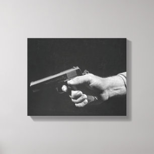 Lienzo Hombre que sostiene el arma