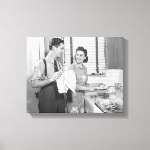 Lienzo Hombre y mujer que hacen platos
