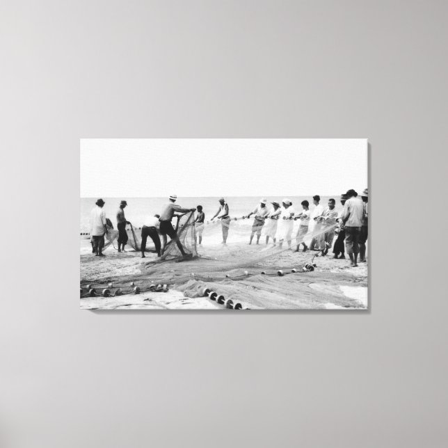 Lienzo Hombres de Hukilau pescan en Hawaii. Fotografía de (Anverso)