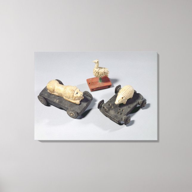 Lienzo Juguetes para niños: un erizo, un león y una palom (Anverso)