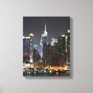Lienzo La luna sube sobre el Midtown Nueva York.