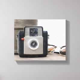 Lienzo Láminas de flores y gafas de cámara de cine de épo