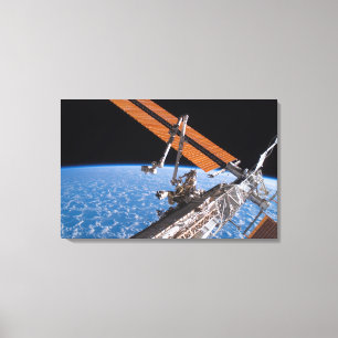 Lienzo Las alas del panel de Canadarm2 y del arsenal