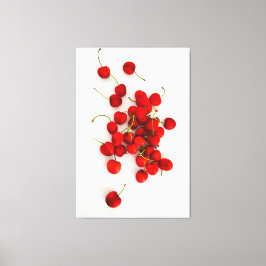 Lienzo Las cerezas rojas con luz natural yacen en blanco