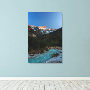 Lienzo Magnífica puesta de sol sobre las montañas y el rí