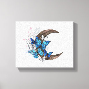 Lienzo Mariposas azules sobre la media luna de madera