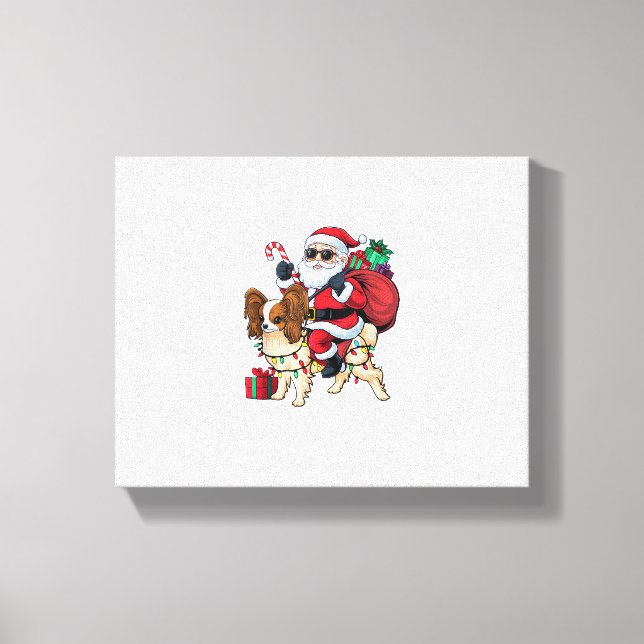 Lienzo Navidades de perros de Papillon iluminando Santa R (Anverso)
