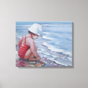 Lienzo Niña pequeña con gorra blanco en la playa