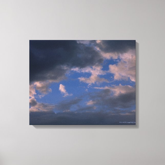 Lienzo Nubes de tormenta contra el cielo azul (Anverso)