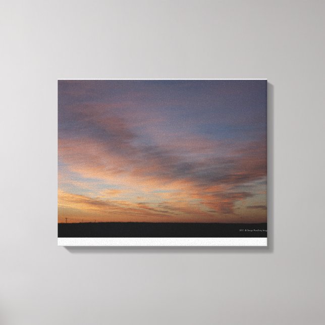 Lienzo Nubes En Un Cielo Naranja Al Amanecer (Anverso)