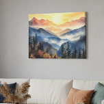Lienzo Paisaje moderno de la montaña de acuarela Sunset<br><div class="desc">Trae la belleza de la naturaleza a tu casa con este impresionante arte de pared de tela estirada, con una brillante puesta de sol de montaña pintada en suaves tonos acuáticos. Capas de nieblas azules se desvanecen a lo lejos, mientras que el intenso cielo irradia ricos tonos de naranja, oro...</div>