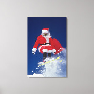 Lienzo Papá Noel en el salto de esquís de una cornisa e