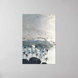 Lienzo Patos, pajares y cisnes en el lago al atardecer