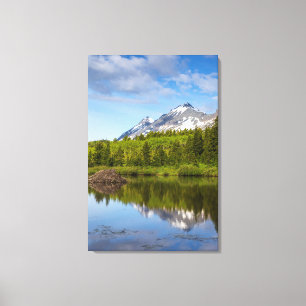 Lienzo Picos de montañas reflejados en una laguna de cast