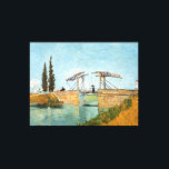 Lienzo Puente Langlois en Arles Vincent Gogh<br><div class="desc">Puente Langlois en Arles. Vincent van Gogh. Un paisaje de otoño. Puente de piedra de cuerda floja sobre el río. Un hombre está cruzando el puente. El río azul fluye bajo el puente. Las nubes cruzan el cielo azul. Reproducción de obras famosas de imágenes artísticas de dominio público.</div>