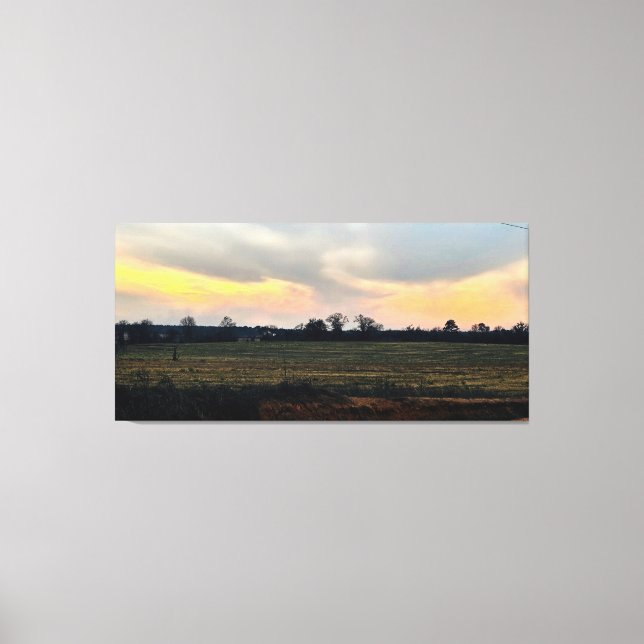 Lienzo Puesta de sol sobre campo rural (Anverso)