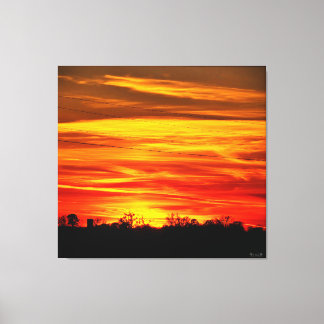 Lienzo Puesta de sol vibrante sobre árboles