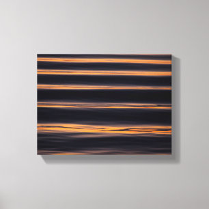 Lienzo Reflexión de la puesta de sol sobre el río