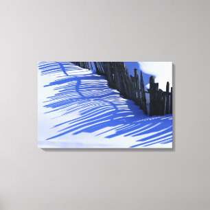 Lienzo Sombra de la cerca en nieve