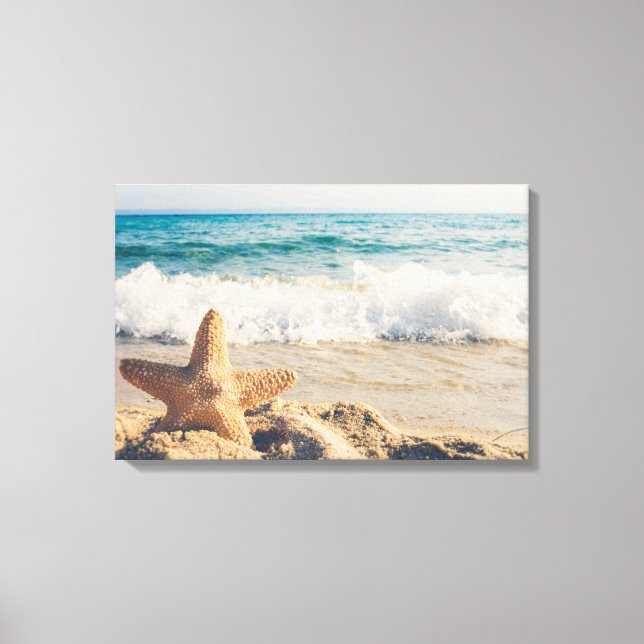 Lienzo Starfish en una foto de una playa de arena (Anverso)