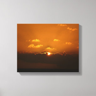 Lienzo Sun Behind Clouds I Naranja Sunset Photo