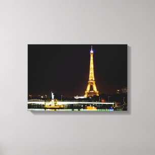 Lienzo Torre Eiffel iluminada en París por la noche