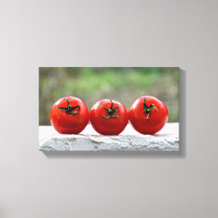 Lienzo Tres tomates en la pared