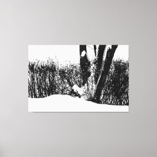Lienzo Un árbol y arbustos en la nieve