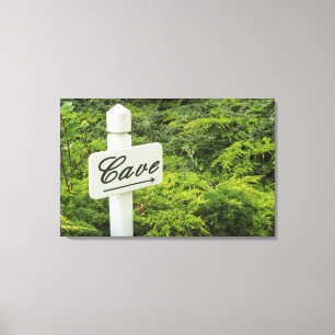 Lienzo Un letrero que apunta a la bodega (Cueva) en