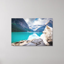 Lienzo Un perro blanco sentado sobre una formación rocosa