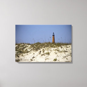 Lienzo Vista de playa del faro de Ponce Inlet envuelto en