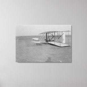Lienzo Wilbur Wright en un avión dañado después