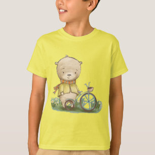 lindo oso de peluche en una camiseta para biciclet