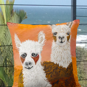 Llamas curiosas contra el Cojín decorativo del cie