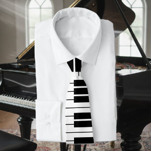 Llave de piano blanco y negro con corbata de cuell