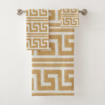 Llave griega dorada en blanco