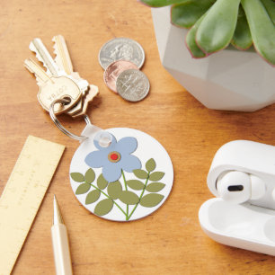 Llavero С una flor azul simple